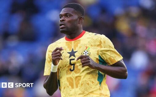 Thomas Partey playing in a Ghana national team football kit