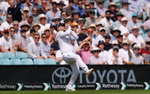 Glenn Phillips raising his bat to celebrate a maiden Test century for New Zealand against England