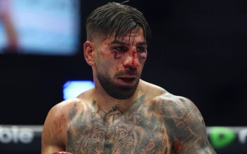 Ilia Topuria looking dejected in the Octagon following his lightweight championship defeat at UFC Freedom 250