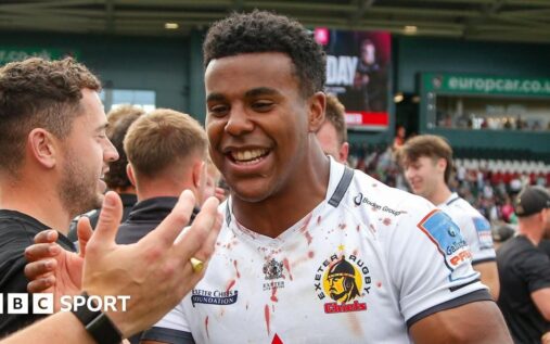 England winger Immanuel Feyi-Waboso running with the ball during a rugby match for Exeter Chiefs
