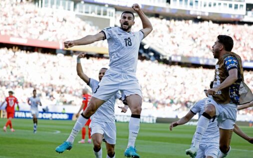 Aymen Hussein playing for the Iraq national team during a competitive international match
