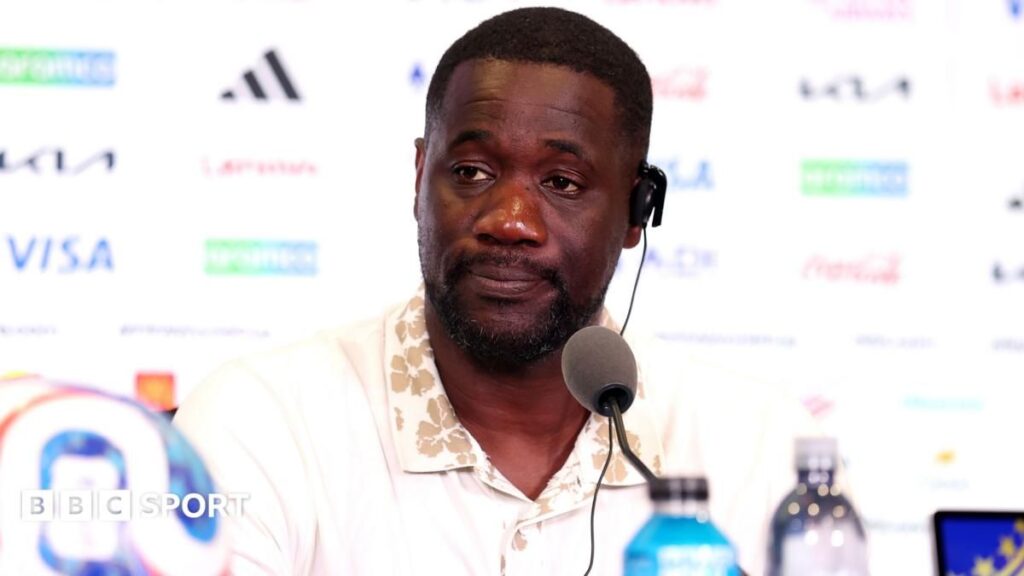 Ivory Coast manager Emerse Fae looking serious on the touchline during a World Cup match