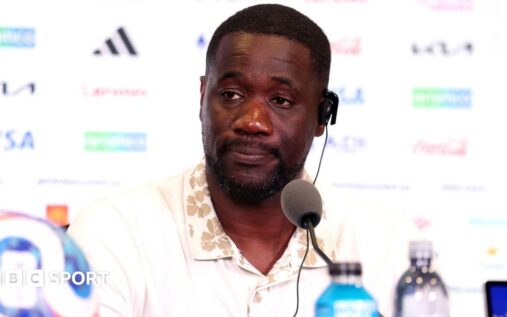 Ivory Coast manager Emerse Fae looking serious on the touchline during a World Cup match