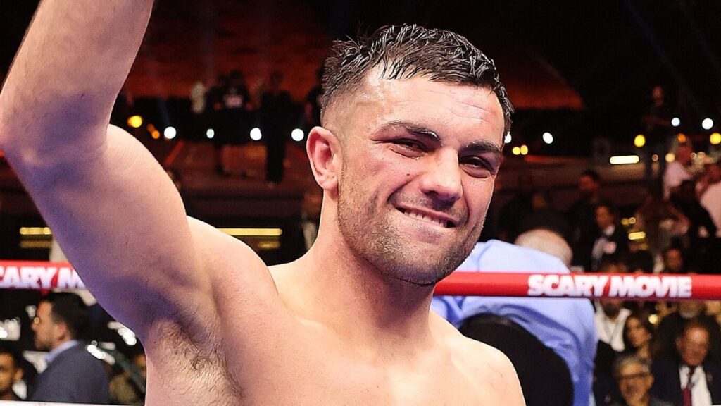 British boxer Jack Catterall standing confidently in the ring after a victory