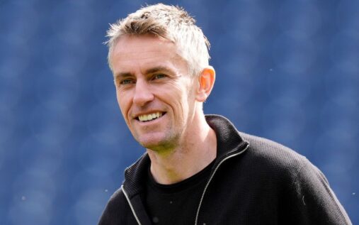 Kieran McKenna gesturing on the touchline during an Ipswich Town match
