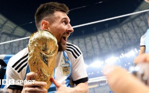 Lionel Messi in action for Argentina pointing to the sky