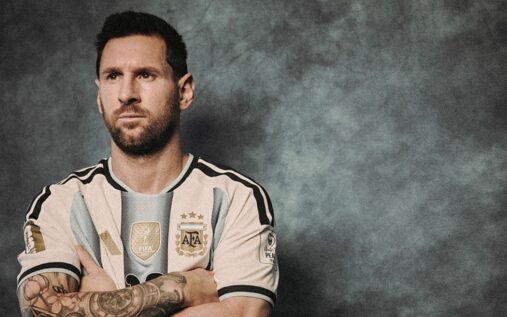 Lionel Messi wearing the Argentina national team kit looking focused on the pitch