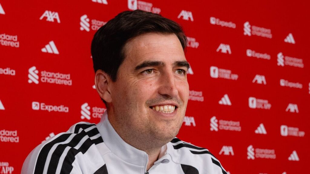New Liverpool manager Andoni Iraola standing on the Anfield touchline