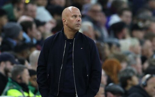 Liverpool manager Andoni Iraola looking thoughtful on the touchline during a Premier League match