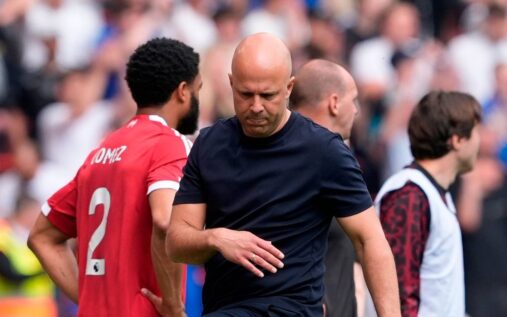 Arne Slot looking thoughtful on the touchline during a Liverpool Premier League match