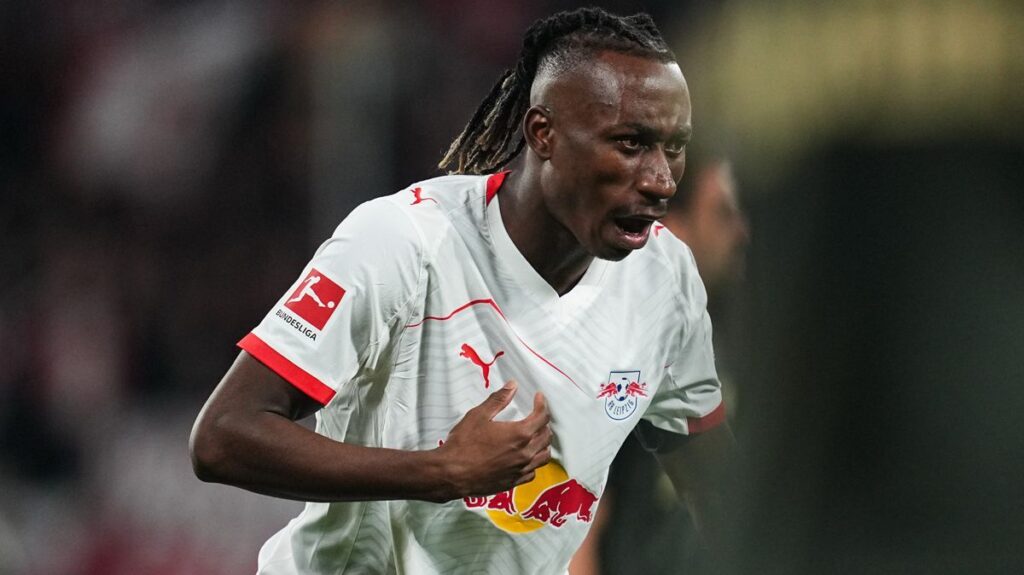 RB Leipzig winger Yan Diomande running with the football during a match