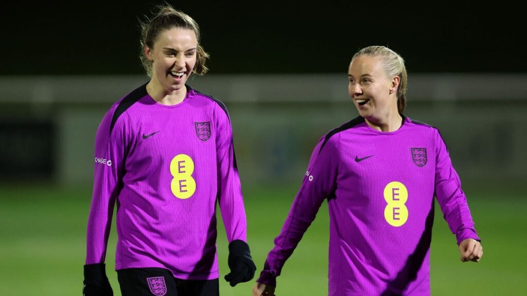 Beth Mead and Niamh Charles playing for the England women's national football team