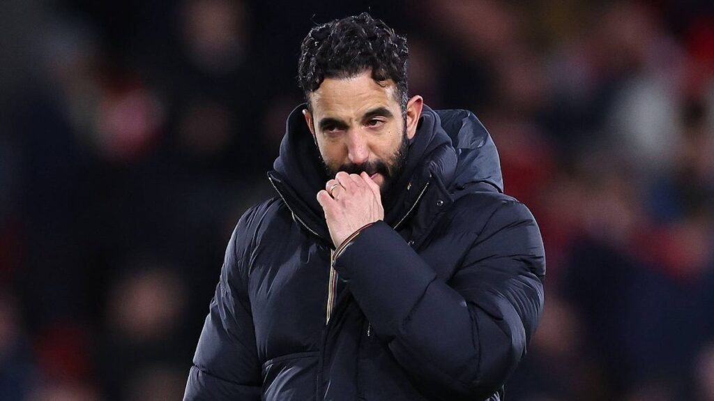 Manchester United manager Ruben Amorim looking dejected on the touchline during a Premier League match