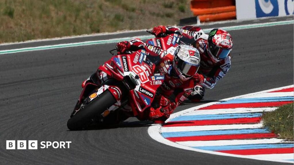 Marc Marquez celebrates winning the Czech Grand Prix on his Ducati MotoGP bike