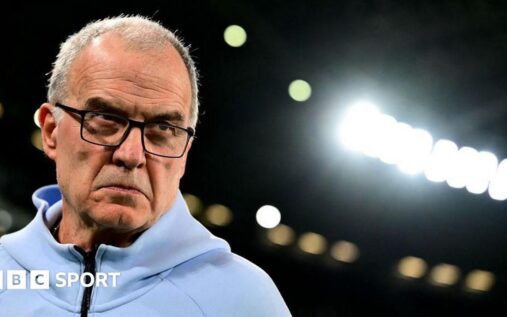 Marcelo Bielsa looking thoughtful on the touchline while managing Uruguay