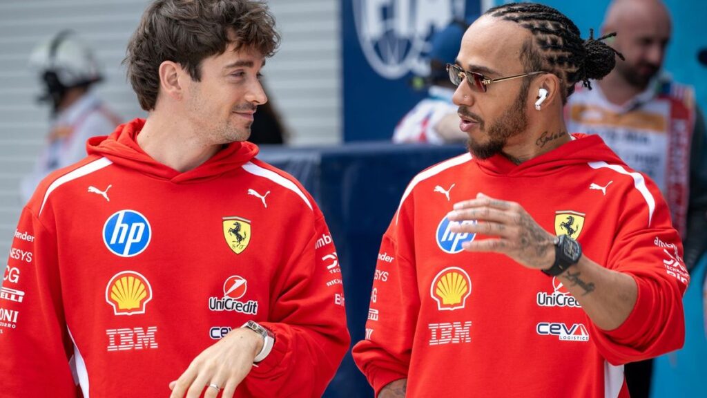 Charles Leclerc and Lewis Hamilton driving the Ferrari SF-26 Formula 1 car around the slow corners of the Monaco circuit.