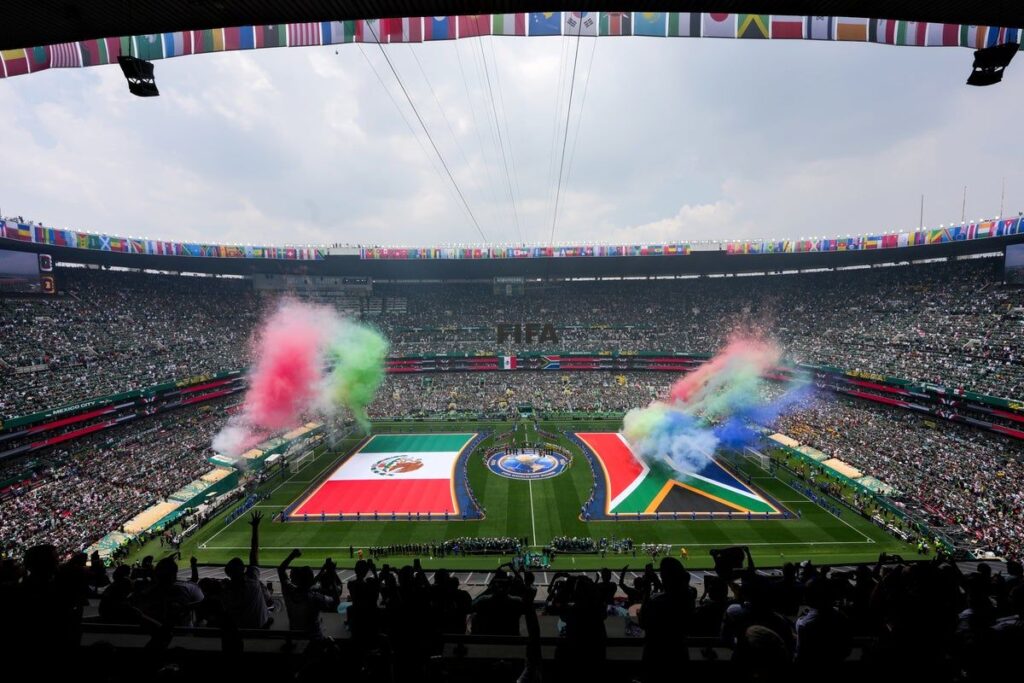 Julian Quiñones celebrating his opening goal for Mexico against South Africa at the Estadio Azteca.