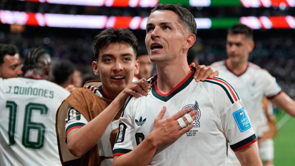 Guillermo Ochoa celebrating a 3-0 victory for Mexico against the Czech Republic at the Azteca Stadium