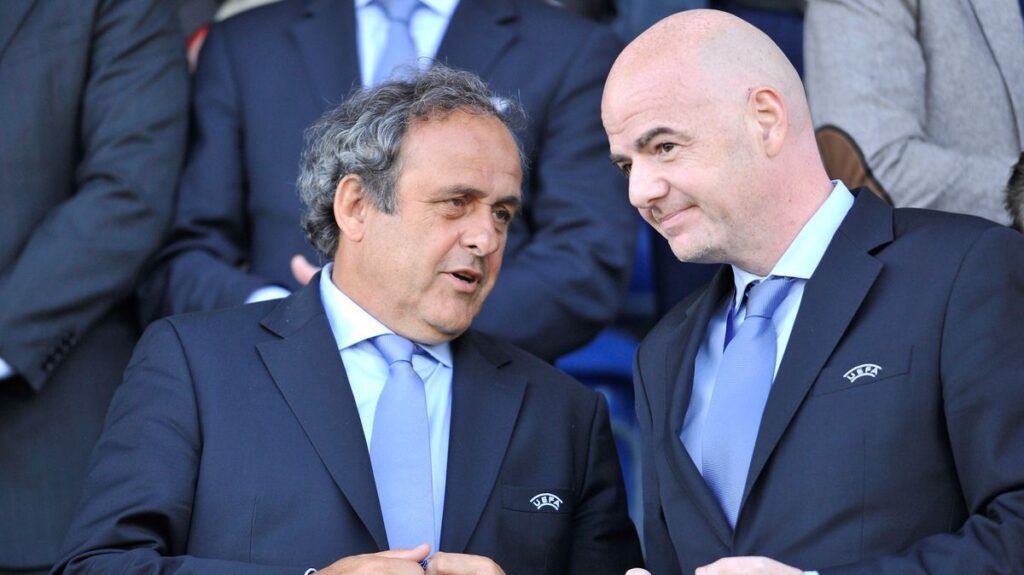 Michel Platini and Gianni Infantino standing together during their time at Uefa
