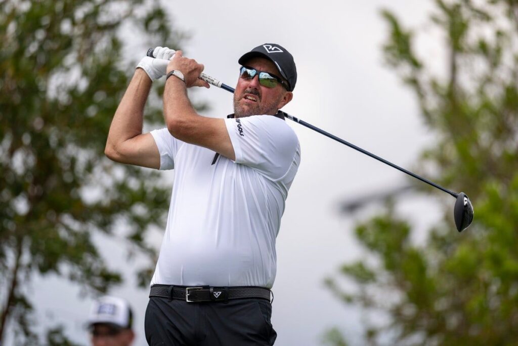 Phil Mickelson looking thoughtful on the golf course during a tournament
