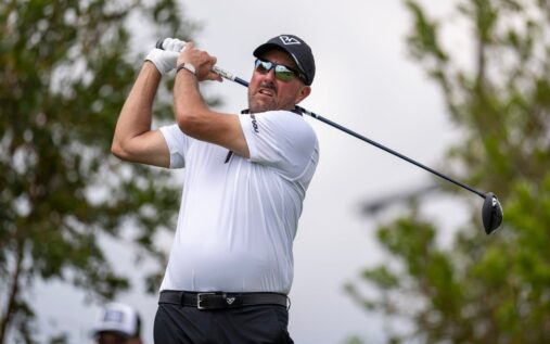 Phil Mickelson looking thoughtful on the golf course during a tournament