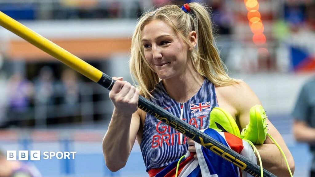 Molly Caudery preparing to pole vault during an athletics competition