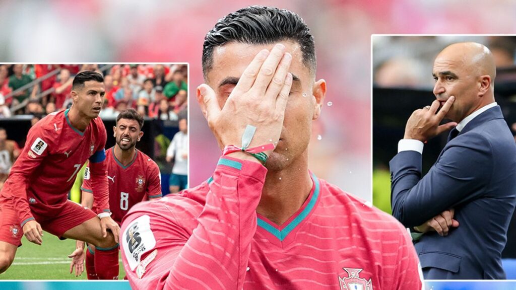 Cristiano Ronaldo looking frustrated on the pitch in a Portugal national team kit