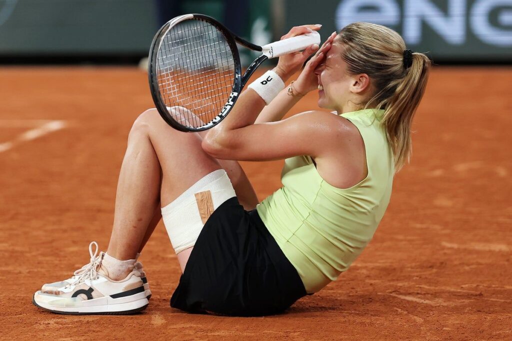 Polish tennis player Maja Chwalinska celebrating a victory on the red clay courts at the French Open