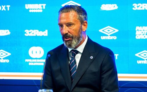Derek McInnes smiling at a press conference after being unveiled as the new Rangers manager