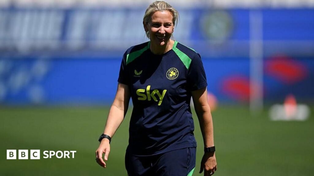 Carla Ward managing the Republic of Ireland women's national team on the touchline