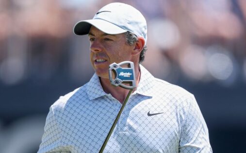 Rory McIlroy examining the course layout at Royal Birkdale ahead of the Open Championship
