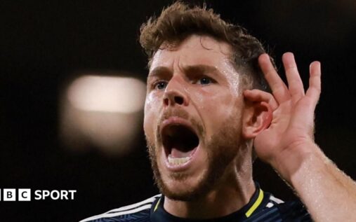 Scotland midfielder Ryan Christie looking determined in the dark blue national team jersey