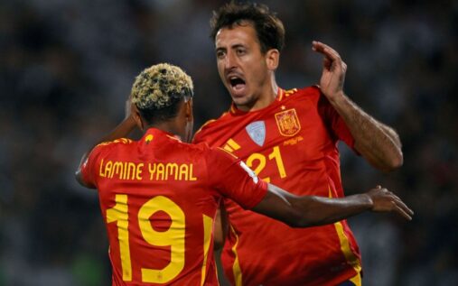 Mikel Oyarzabal and Fabian Ruiz celebrating on the pitch for the Spain national football team