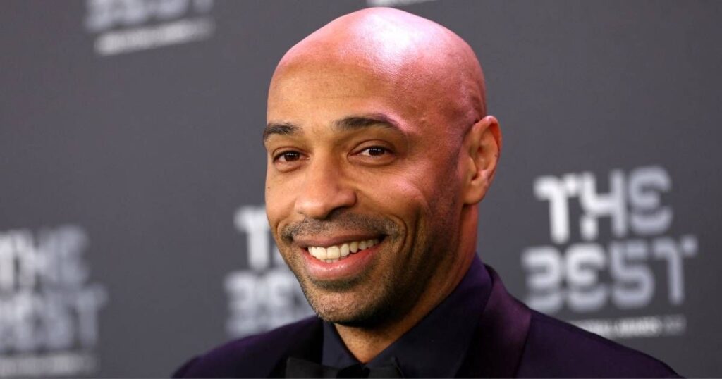 Thierry Henry working as a television pundit during a World Cup match broadcast