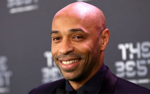 Thierry Henry working as a television pundit during a World Cup match broadcast