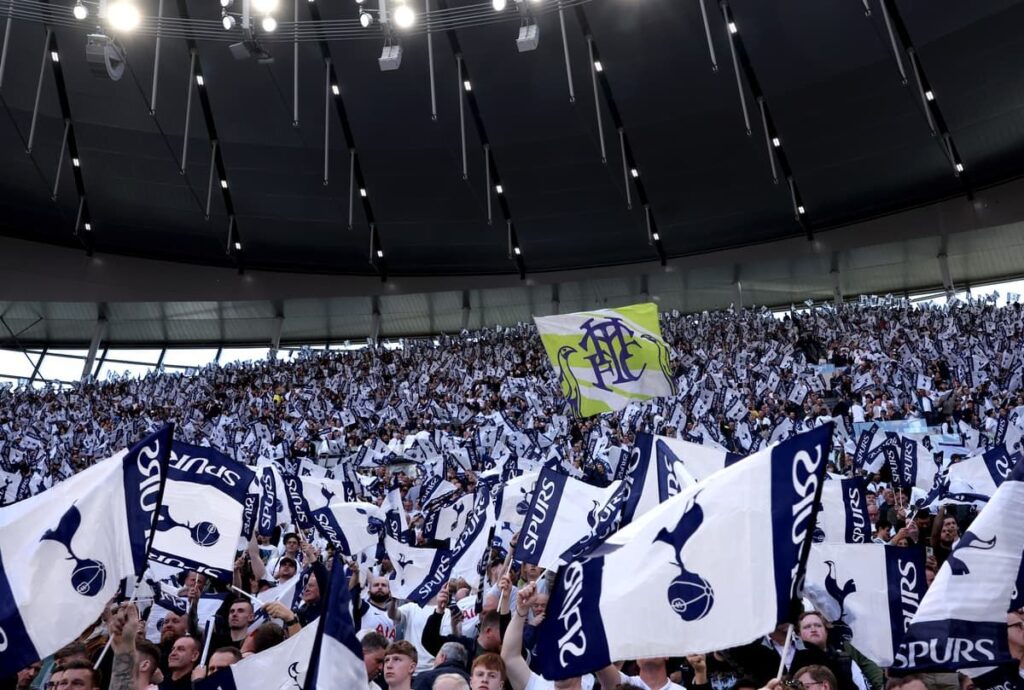 Tottenham Hotspur stadium exterior displaying the club crest