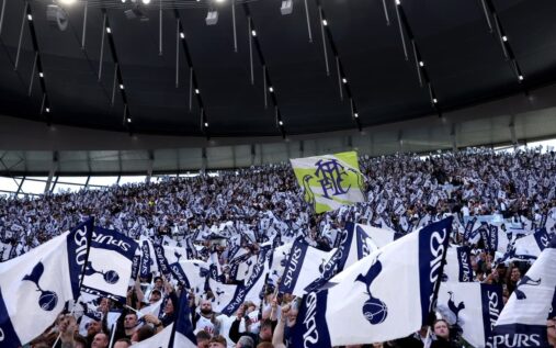 Tottenham Hotspur stadium exterior displaying the club crest